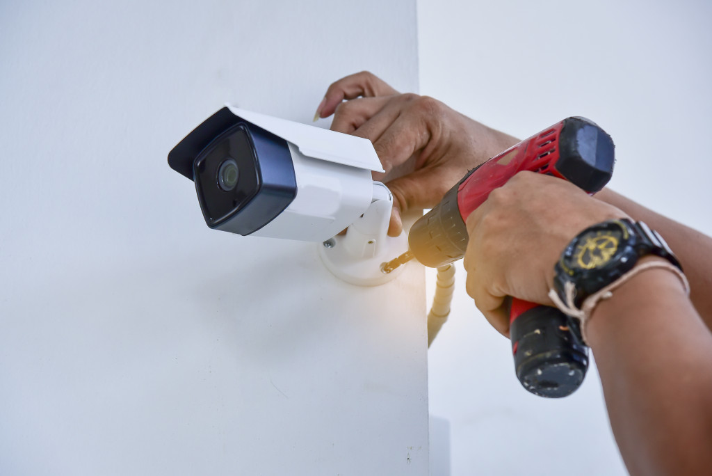 a security camera being installed
