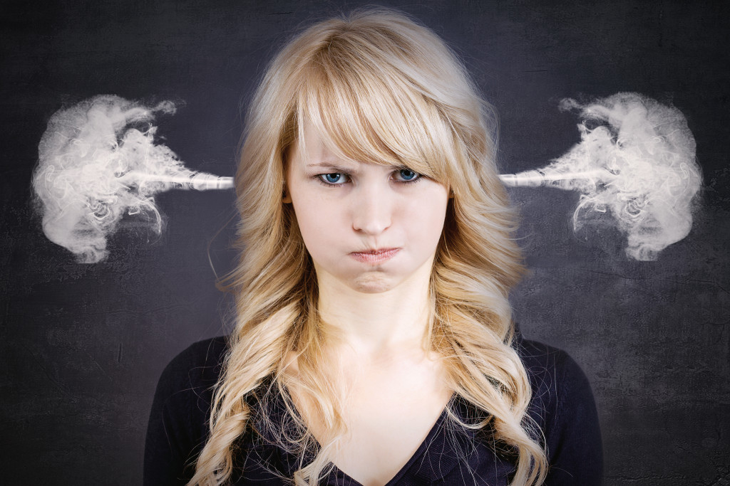 woman irritable smoke coming out of ears