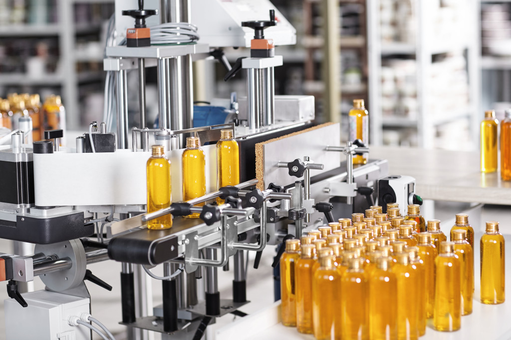 cosmetics factory with yellow shampoo bottles