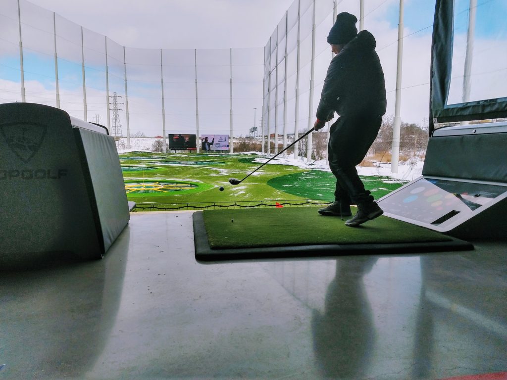 person playing golf at Topgolf